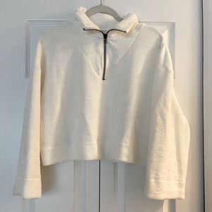 Urban Outfitters. Ribbed white 3-quarter zip.